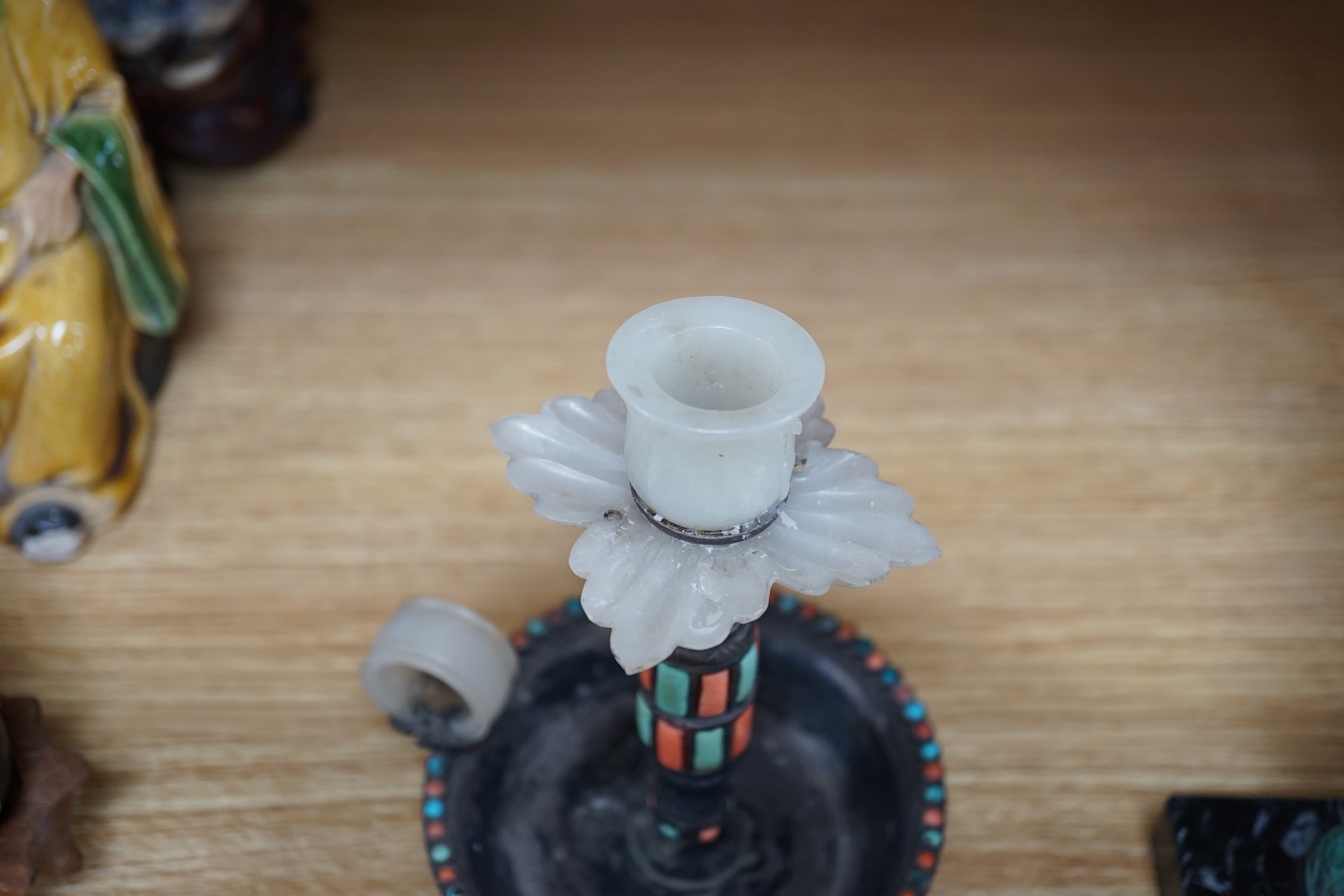 A Chinese white metal jade, coral and turquoise mounted chamberstick, late 19th century, the jade possibly earlier 15cm